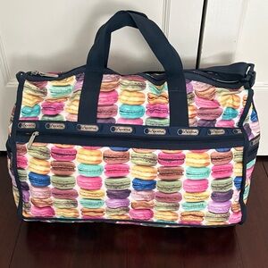 LeSportsac Multicolor Macaron Print Travel Bag with Navy Trim